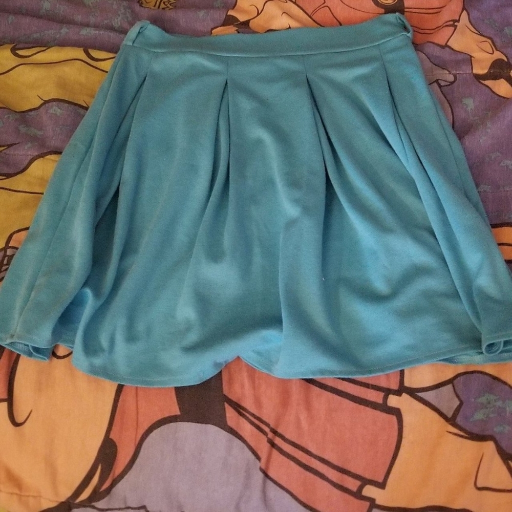 Blue skirt with a small stain